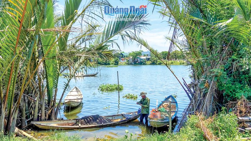 Những hàng dừa nước ở ven sông Phước Giang được người dân thôn Hội An gìn giữ.     ẢNH: Đ.SƯƠNG 